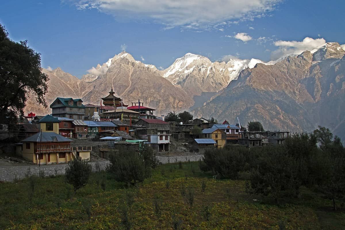 Kalpa village rooftops beneath the snow-capped Kinnaur Kailash range